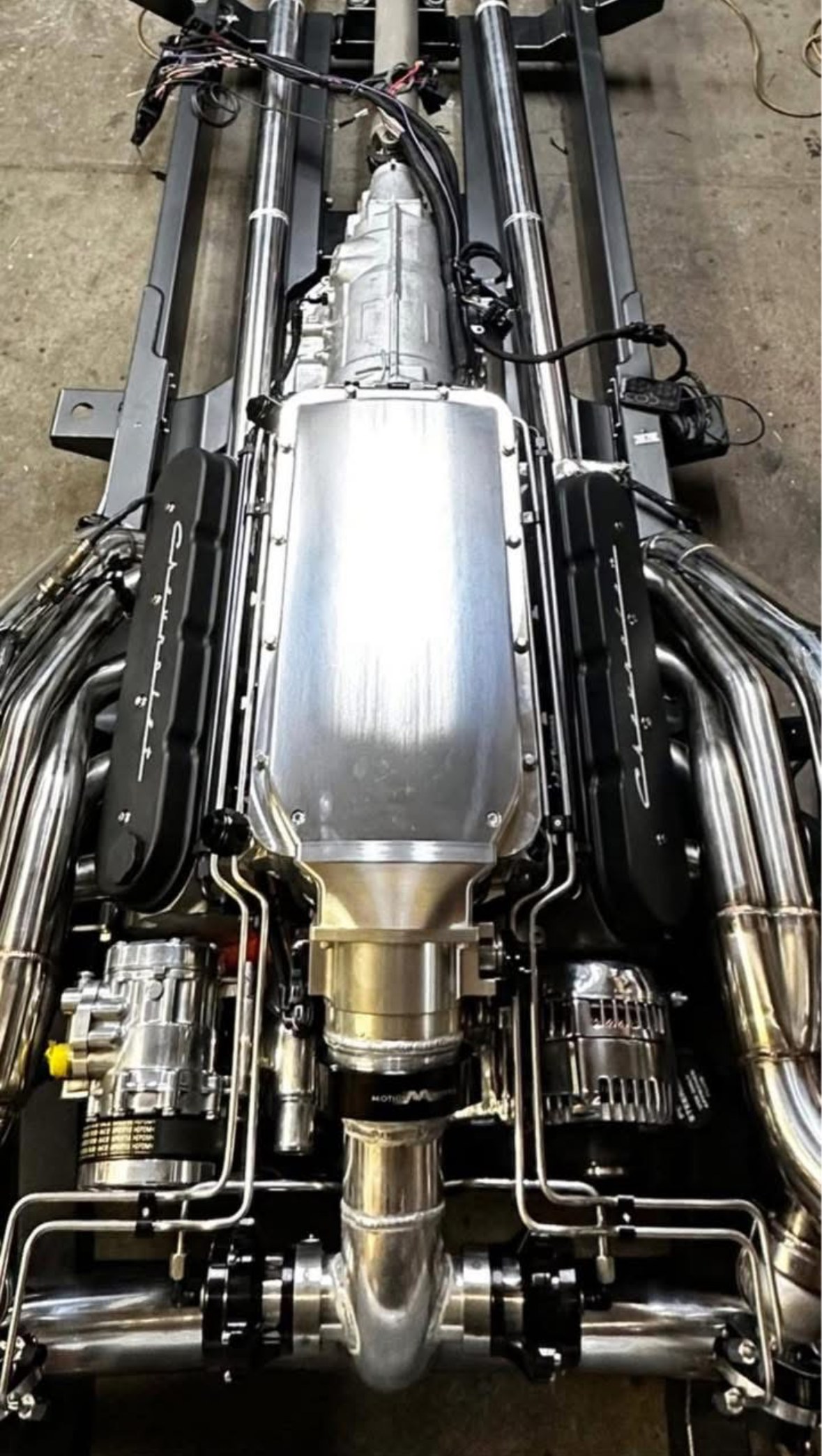 Stainless headers and exhaust on a bare chassis, seen from above