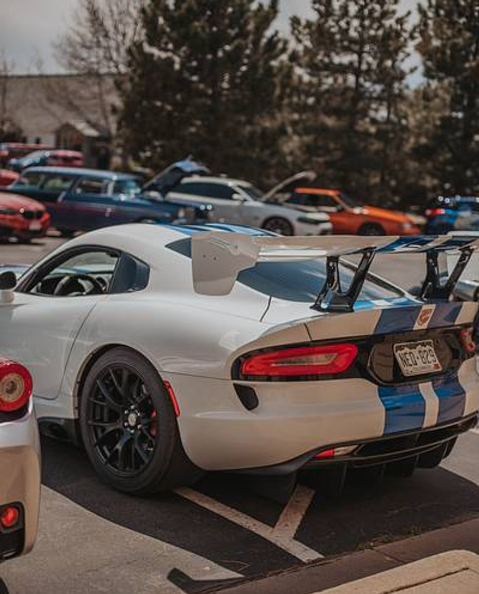 White Viper ACR with blue stripes, rear three-quarter view